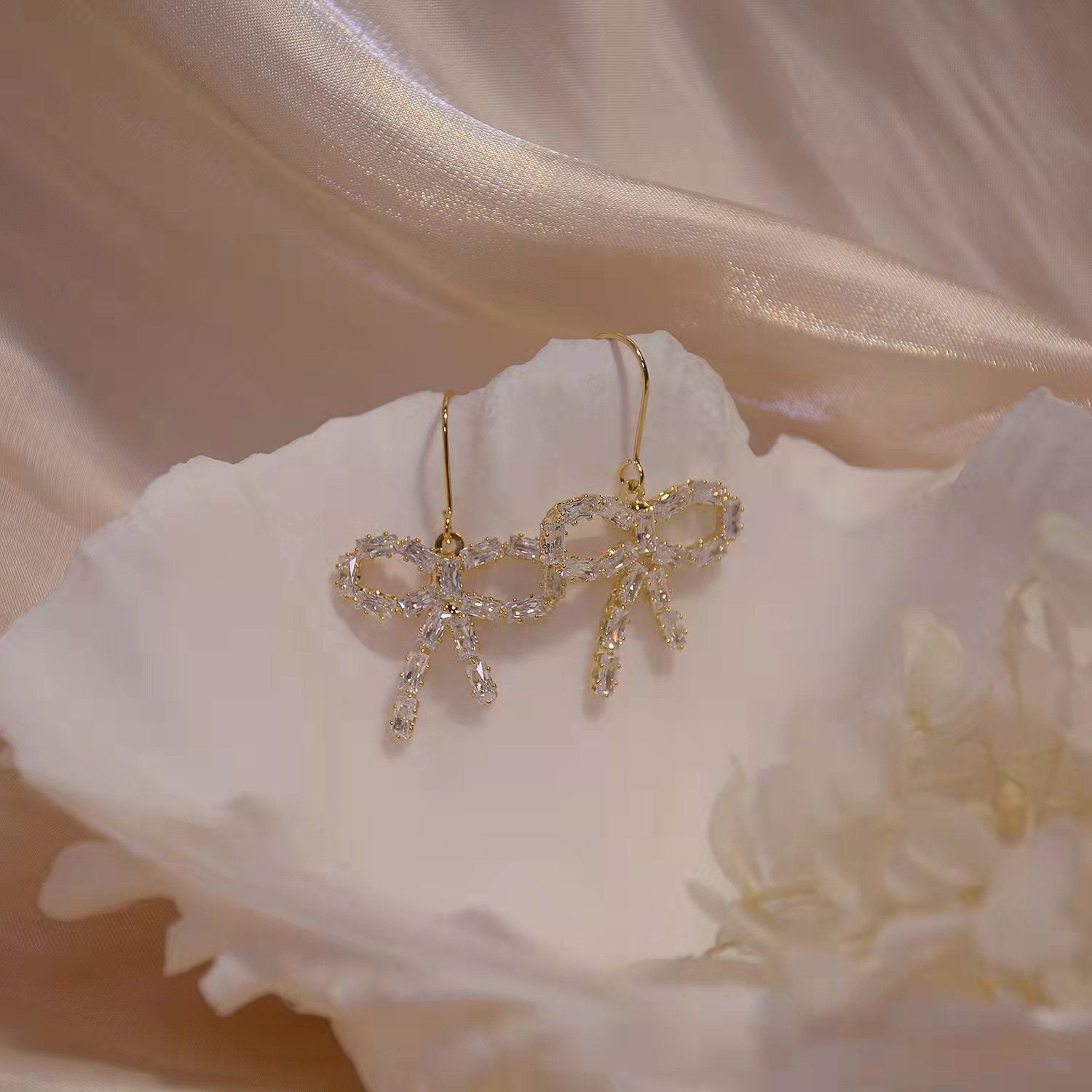 CRYSTAL BOW EARRINGS - STAY FANCY