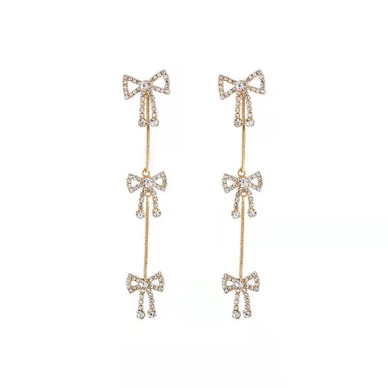 DIAMOND BOW EARRIGNS - STAY FANCY